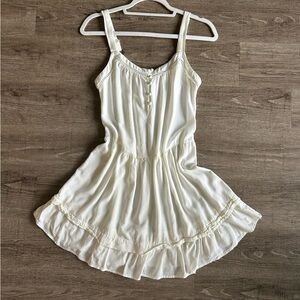 White Babydoll Dress with lace ruffle trim and button front